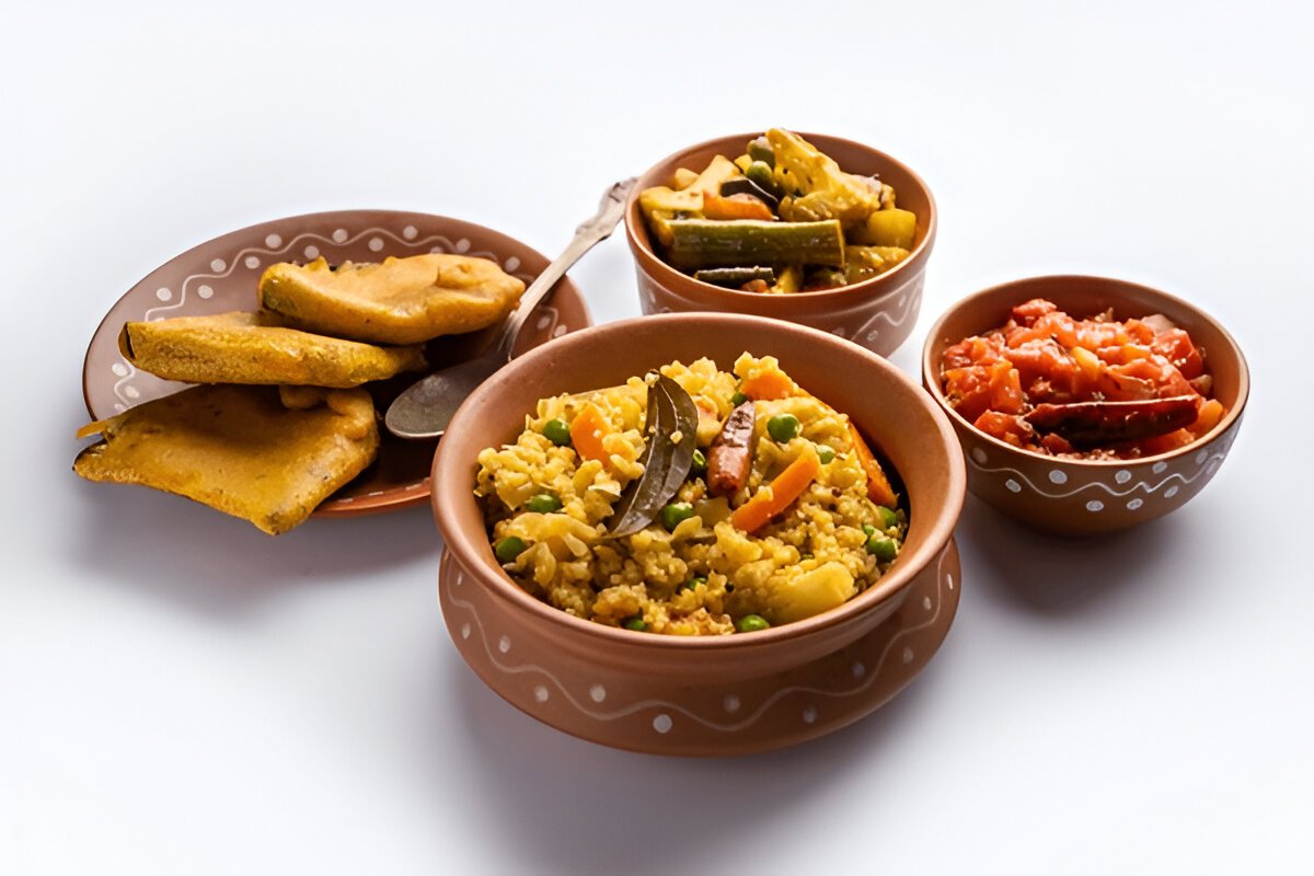 Durga Puja or pooja festival. Khichadi, labra, tomato chutne