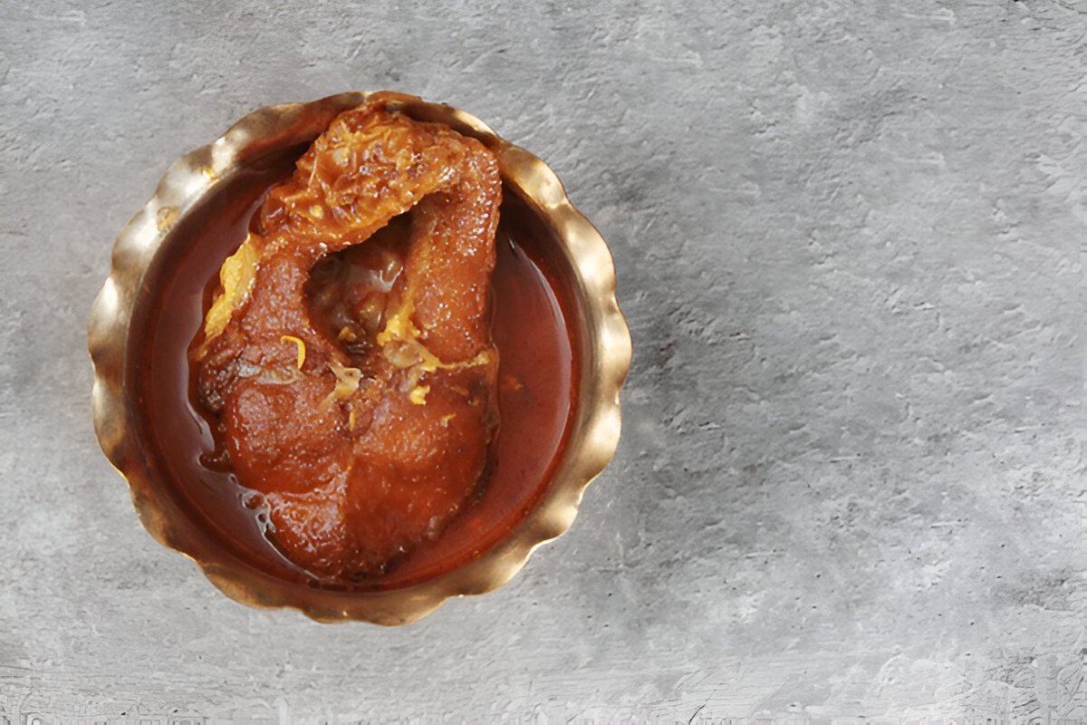 Rohu fish curry or Rui Macher Kalia in a authentic presentation