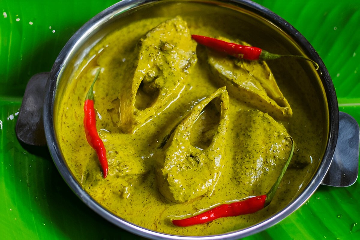 Sorshe Illish or Hilsa fish cooking with mustard seed
